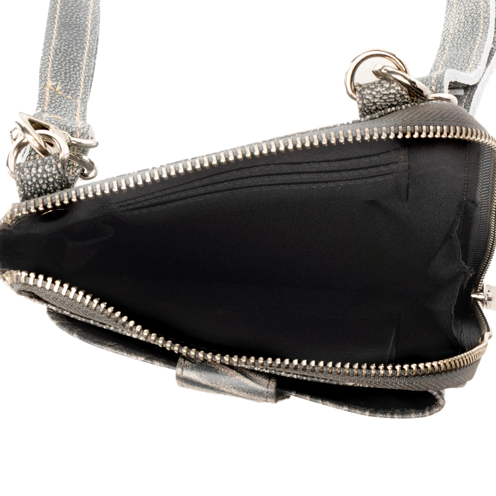 Myra Coyote Bloom Embossed mini sling for Women in sage with floral detail