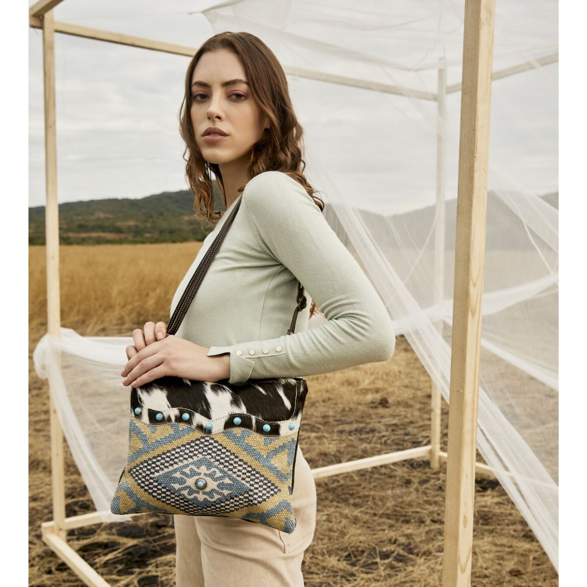 Myra Tufts Pattern Woven Hairon Crossbody – Tribal Geometric Print with Leather Strap and Studded Accents
