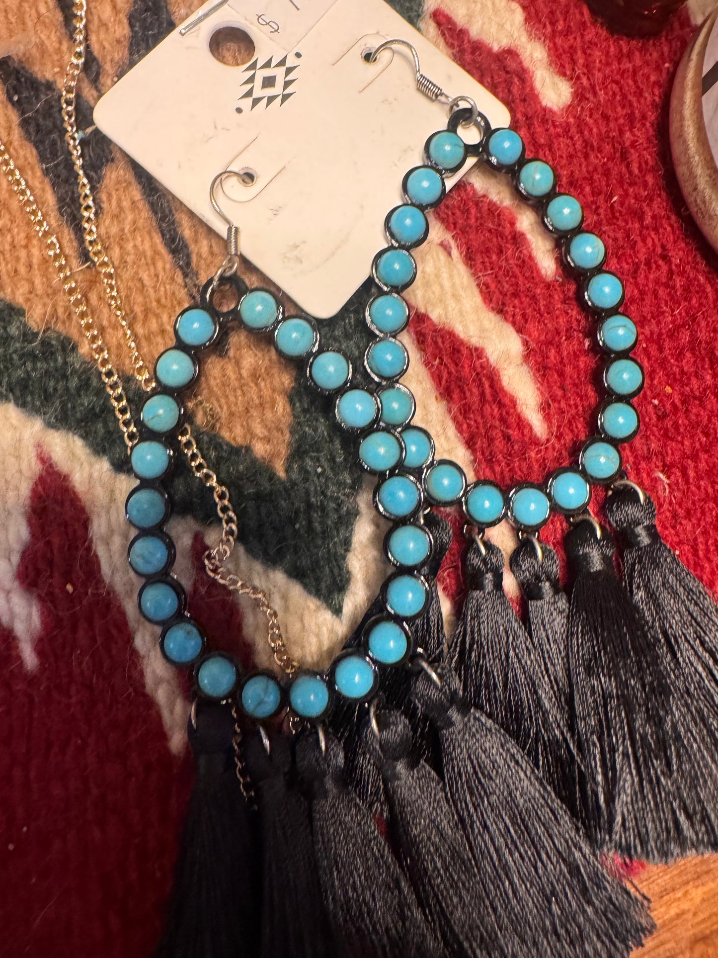 tq and blck fringe earrings